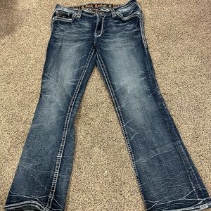 Size 32 Rock Revival boot leg jeans!!